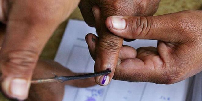 Voting process with inked fingers